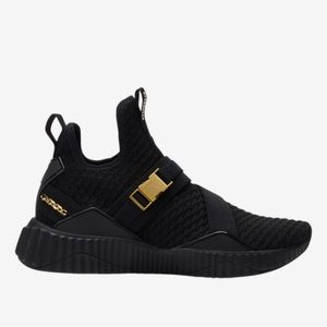 - NEW STILL WRAPPED puma mod defy sneakers gold and black 7.5